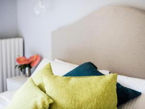 Cama ou camas em um quarto em Punta Ala Sea View Apartments