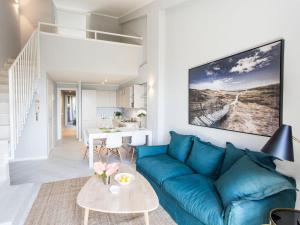 Uma área de estar em Punta Ala Sea View Apartments