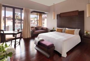 Postel nebo postele na pokoji v ubytování Anantara The Palm Dubai Resort