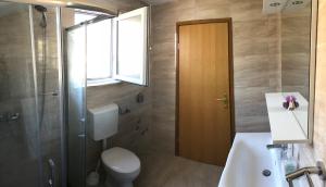 Koupelna v ubytování Apartment LANKA