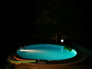 an empty swimming pool in the dark at night at Ferienwohnung Knoche in Zittau