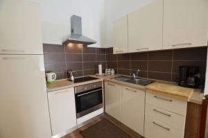 Küche/Küchenzeile in der Unterkunft Yulia Apartments