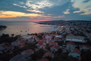 an aerial view of a city with a harbor at Downtown Sweet Studio in Novalja