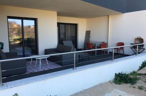 Balkón nebo terasa v ubytování Domaine du Frassu, T2 standing, plage à pied + 5 fotografií