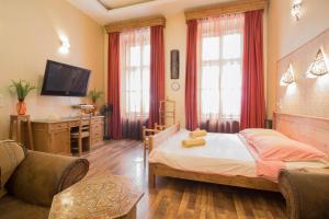 Cama o camas de una habitación en Budapest Royal Suites