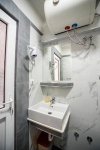 Koupelna v ubytování Hotel Klironomi