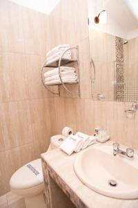 Koupelna v ubytování Hotel Arcangel