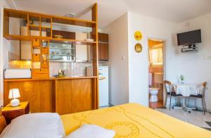 A kitchen or kitchenette at Apartments Gracia - with great view