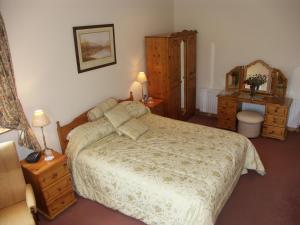 Postel nebo postele na pokoji v ubytování Cahergal Farmhouse B&B