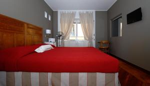 Postel nebo postele na pokoji v ubytování B&B Residenza Cavour