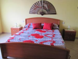 A bed or beds in a room at B&B Monte Gruttas