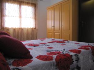 A bed or beds in a room at B&B Monte Gruttas