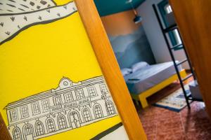 Rúm í herbergi á Our Way Guest House & Hostel