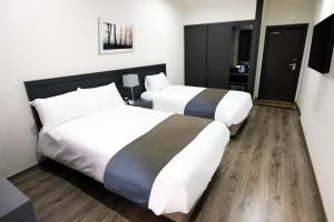 Ένα ή περισσότερα κρεβάτια σε δωμάτιο στο Sobaeksan Punggi Spa Resort