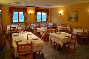 Un restaurante o sitio para comer en Hotel Turmo