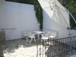 Uma varanda ou outra área externa em Villa Frideriki