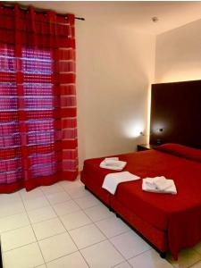 Posteľ alebo postele v izbe v ubytovaní Residence Domus
