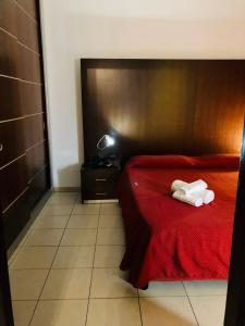 Posteľ alebo postele v izbe v ubytovaní Residence Domus