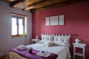 Postel nebo postele na pokoji v ubytování Agriturismo Angiò nel Cerè