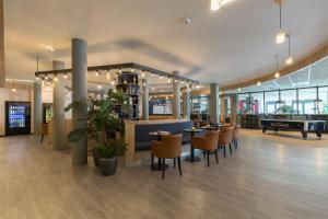 A restaurant or other place to eat at Best Western Amsterdam