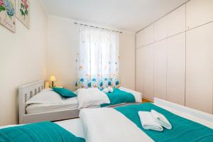 Postel nebo postele na pokoji v ubytování Apartment Caesar by Belmont Realty