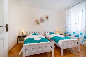 Postel nebo postele na pokoji v ubytování Apartment Caesar by Belmont Realty