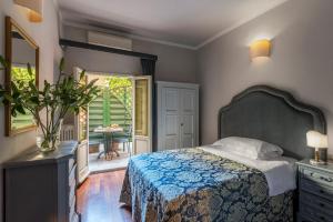 Postel nebo postele na pokoji v ubytování Hotel Palazzo dal Borgo