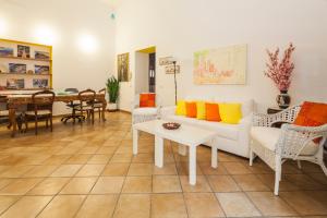 a living room with a couch and a table at Casa Lungomare in Salerno