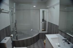 Ένα μπάνιο στο Apartamento SC Victoria +19 φωτογραφίες