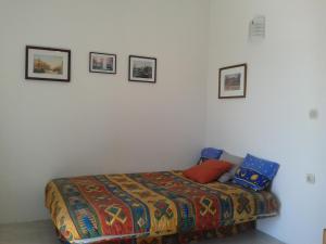 Ein Bett oder Betten in einem Zimmer der Unterkunft Apartments Lončarević