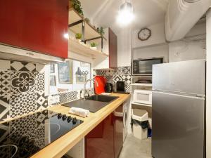 Virtuvė arba virtuvėlė apgyvendinimo įstaigoje Welkeys - Choiseul Apartment