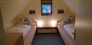 
Uma cama ou camas num quarto em Pension "Lug ins Land"
