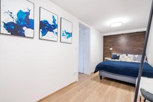 Posteľ alebo postele v izbe v ubytovaní BpR Luxurious & Stylish Duplex Home