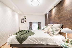 Posteľ alebo postele v izbe v ubytovaní BpR Luxurious & Stylish Duplex Home