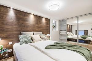 Posteľ alebo postele v izbe v ubytovaní BpR Luxurious & Stylish Duplex Home