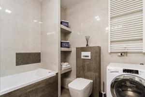 Kúpeľňa v ubytovaní Apartments Kraków Zablocie by Noclegi Renters