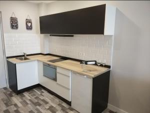 Kuchyň nebo kuchyňský kout v ubytování RANDMAR APARTMENT COSTA DEL SOL