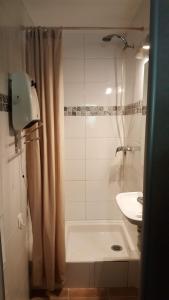 a bathroom with a shower and a sink at Domaine de la pinède Le Lavandou Pramousquier in Le Lavandou +16 photos