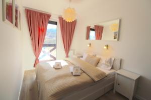 Posteľ alebo postele v izbe v ubytovaní Apartamenty Piano by Royal Aparts