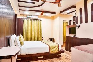 Krevet ili kreveti u jedinici u okviru objekta Hotel Bangabhumi