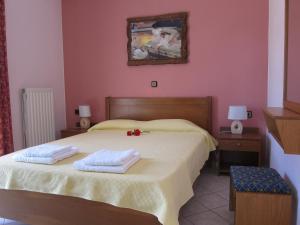 Postel nebo postele na pokoji v ubytování Stelios Apartments