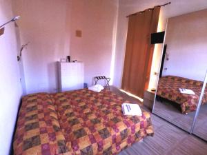 Posteľ alebo postele v izbe v ubytovaní Tenuta La Rosa B&B