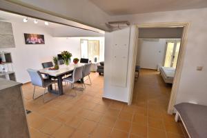 Posedenie v ubytovaní Villa Ela Ferienappartements