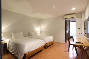 Postel nebo postele na pokoji v ubytování VIYA lodge + 27 fotografií