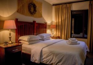 African Safari Lodge客房内的一张或多张床位