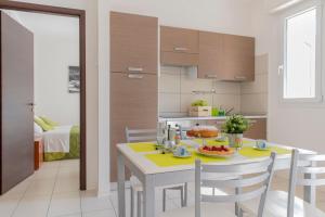 A kitchen or kitchenette at Green Residence