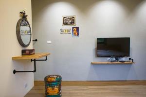 TV a/nebo společenská místnost v ubytování New Live B&B
