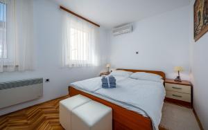 Posteľ alebo postele v izbe v ubytovaní Apartment Branka - Monterol