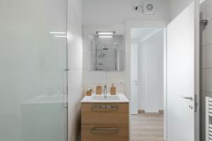 Ванная комната в Varenna Hill apt