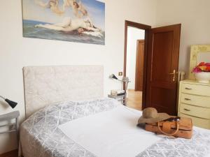 Postel nebo postele na pokoji v ubytování Palazzetto del Pittore